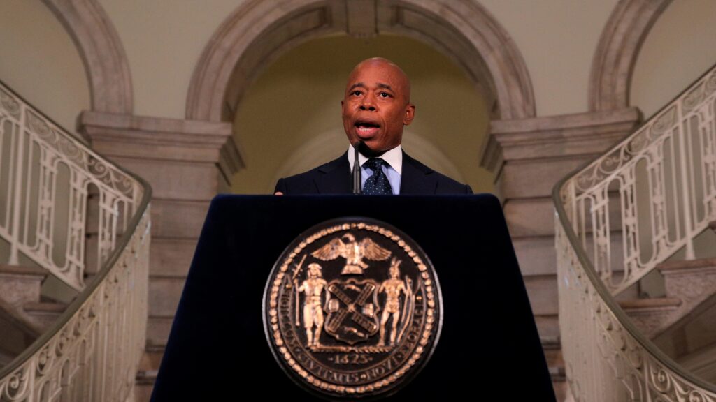Mayor Eric Adams speaking at a press conference in New York City.