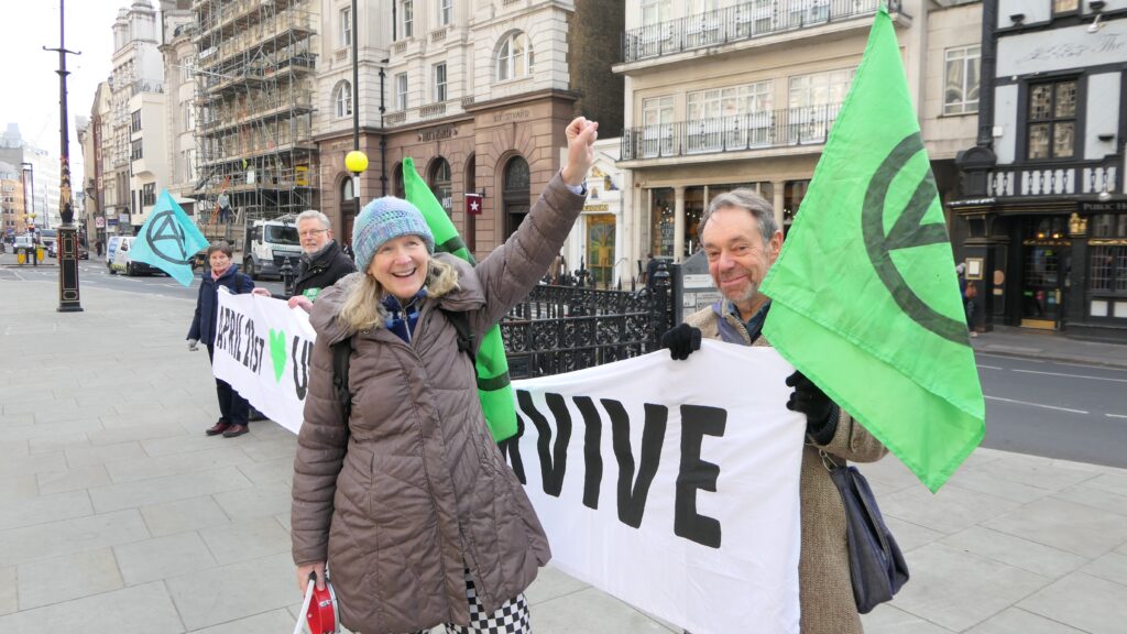 Jenny Condit and Robert Oulton, two senior climate activists, at a protest in London.